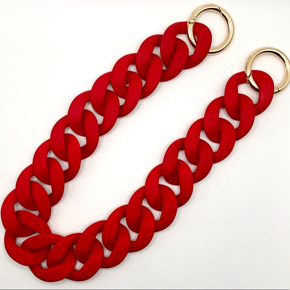 Smooth finish acrylic large chunky chain link bag strap in red, gold hardware